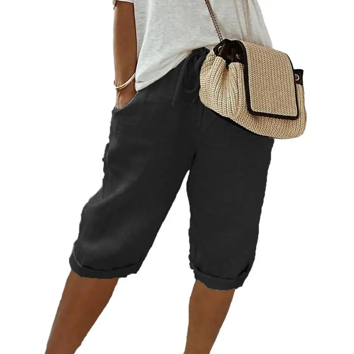 Dames vintage kniebroek met elastische taille, losvallend, ideaal als casual zomerbroek met handige zakken.
