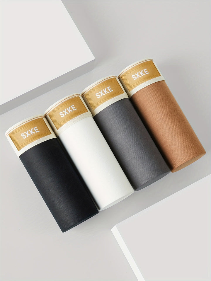 "4-pack heren boxershorts in ademend katoen, effen kleuren, comfortabele pasvorm voor dagelijks gebruik en sport."