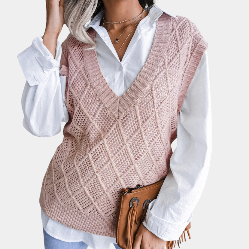 Roze gebreide dames trui, comfortabel en trendy, ideaal voor casual winterkleding.