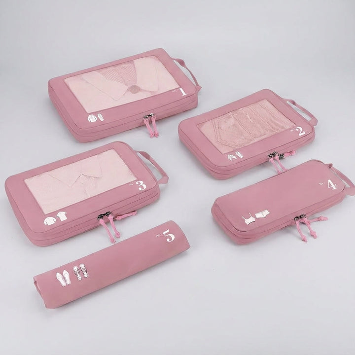 Duurzame 5-delige set bagage organizers voor handige indeling en overzicht in je koffer.