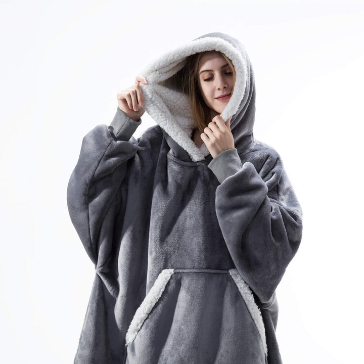 Heerlijk warme loungewear hoodie deken, ideaal voor een gezellig moment.