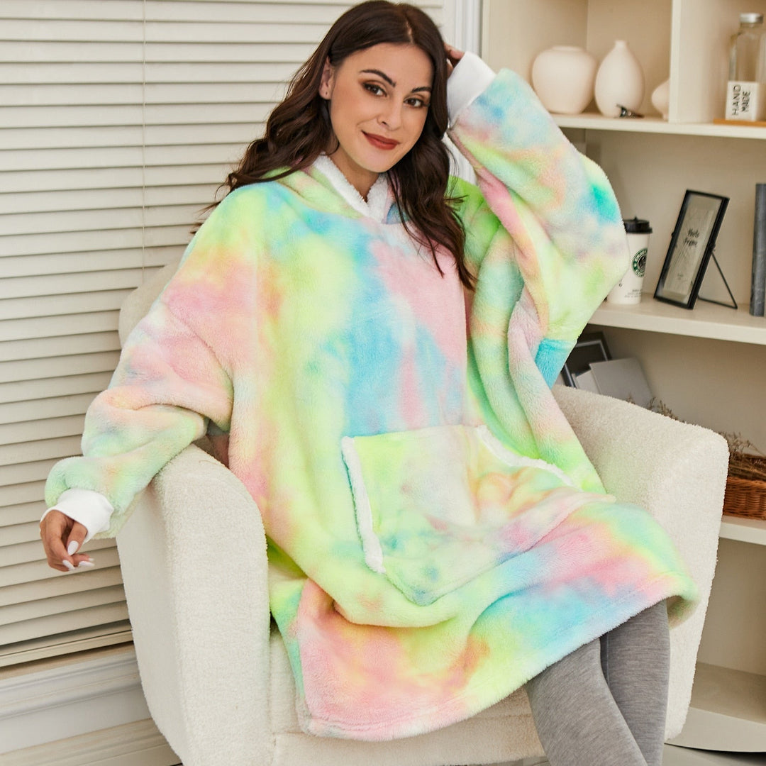 Gezellige hoodie deken in pluche, voor ultieme warmte en ontspanning.