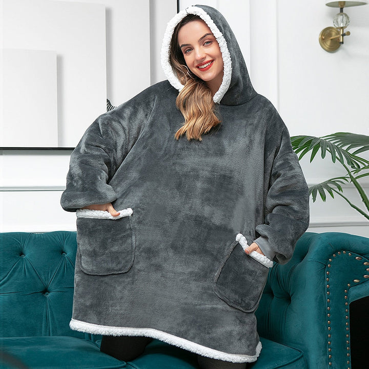Comfortabele thuis outfit: een zachte unisex hoodie deken.