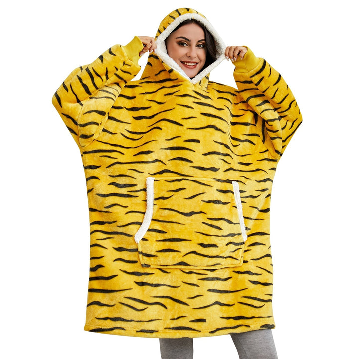 Oversized hoodie deken in pluche, perfect voor loungewear en ontspanning.