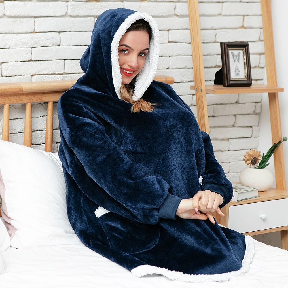 Zachte pluche hoodie deken, de ideale cadeautip voor warmtezoekers.