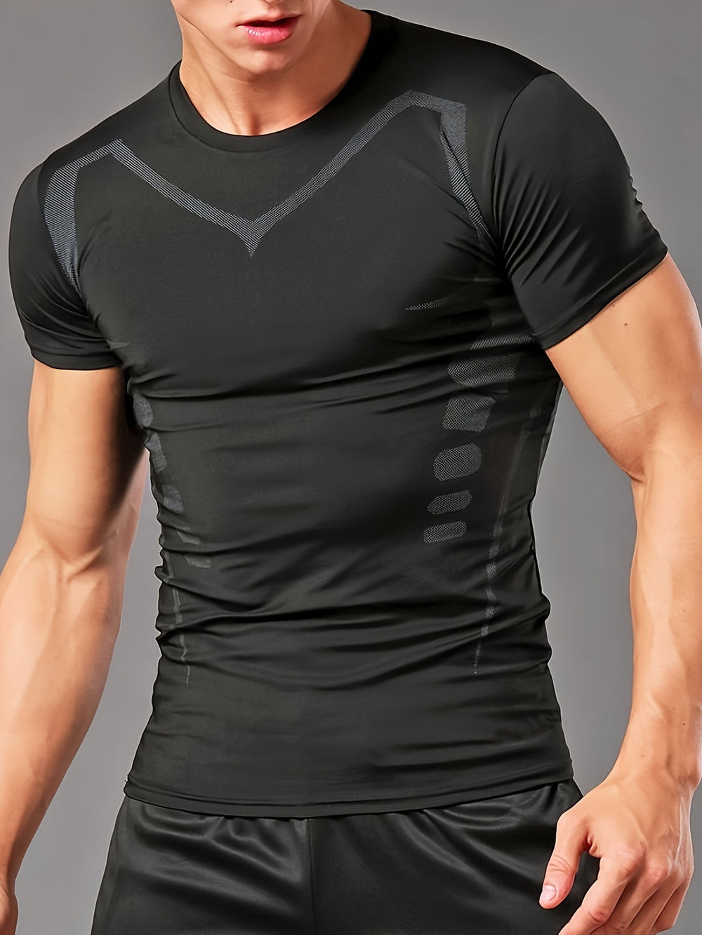 "Ademend heren Muscle Fit sport T-shirt, compressie, strak design, kuitervolg hoge performance, ideaal voor training."