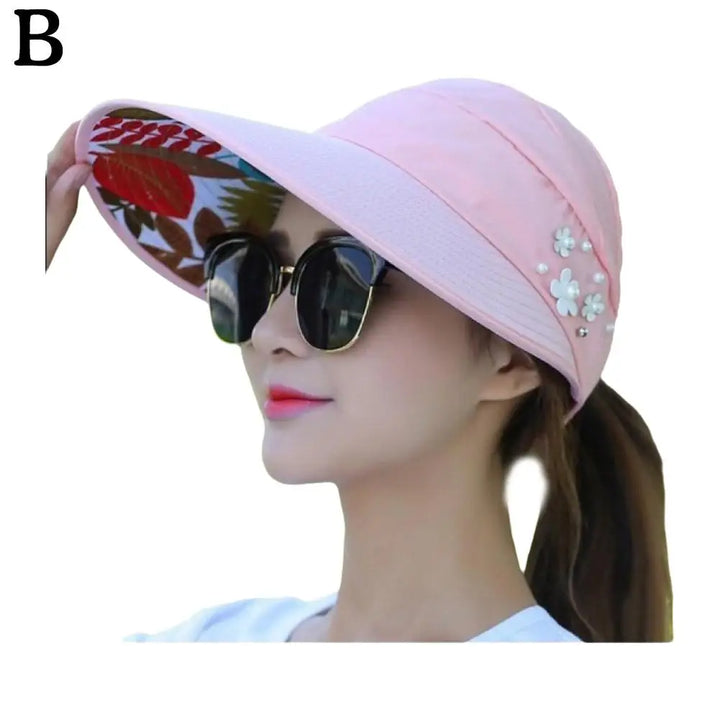 "Anti-UV dames strandhoed met brede rand, opvouwbaar polyester, beige kleur, biedt stijlvolle zonbescherming en comfort"