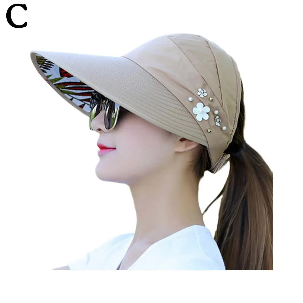 "Anti-UV dames strandhoed met brede rand, opvouwbaar polyester, beige kleur, biedt stijlvolle zonbescherming en comfort"