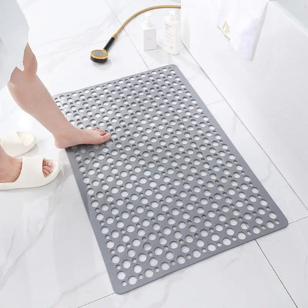 Witte antislip badmat, wasmachinebestendig, ideaal voor een schone douche.