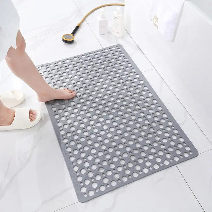 Witte antislip badmat, wasmachinebestendig, ideaal voor een schone douche.