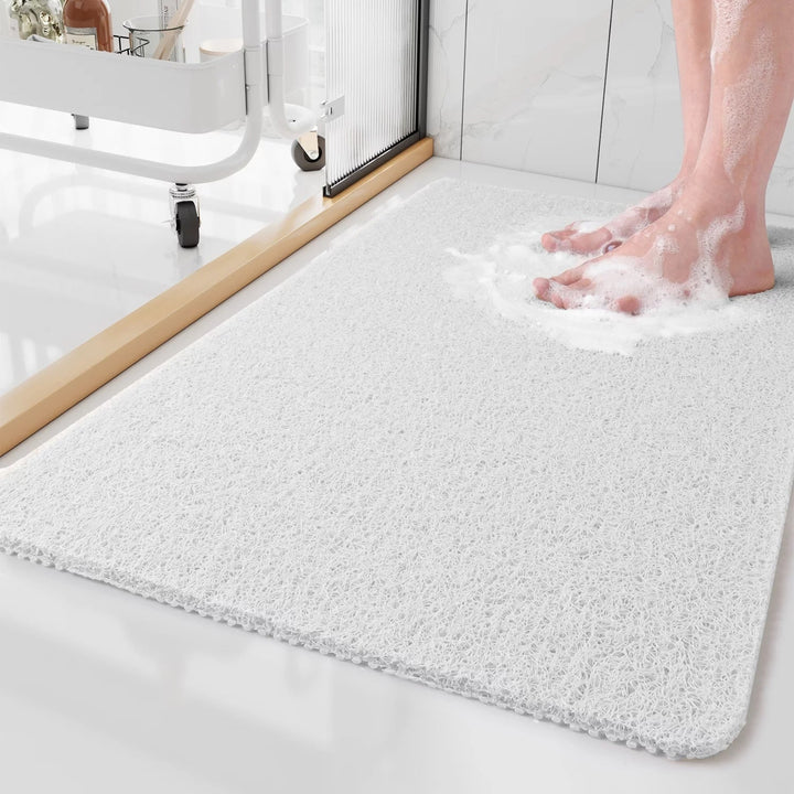 Veilige badmat met antislip functie; biedt stabiliteit en comfort, essentieel badkameraccessoire voor senioren.