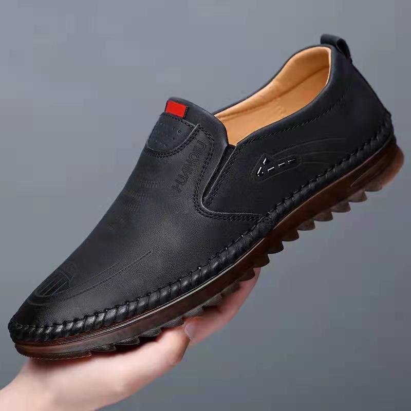 "Antislip leren reisschoenen voor mannen, zwart en bruin, veelzijdig en stijlvol met comfortabele pasvorm en veilige zool."