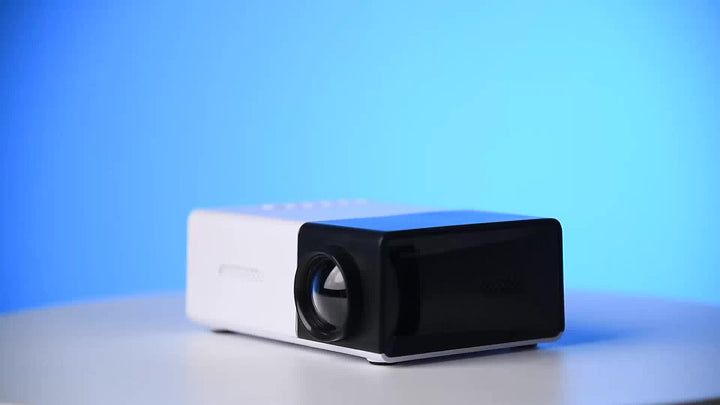 Aurora mini projector met speakers, compact en draagbaar voor thuisbioscoop of kantoorruimte.
