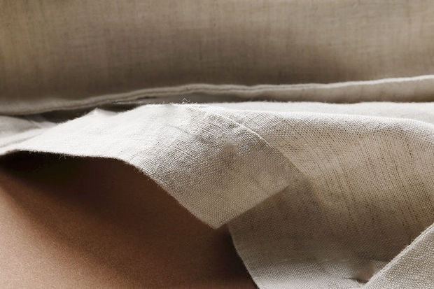 Modieuze beige damesblazer, perfect als overgangsjas, elegant en comfortabel voor alle seizoenen.