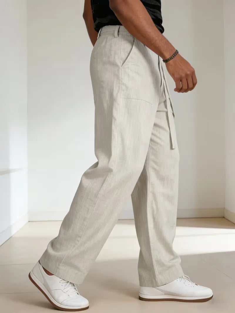 Beige dames pantalon met strikceintuur, straight leg, ideaal voor een zakelijke of smart-casual look.