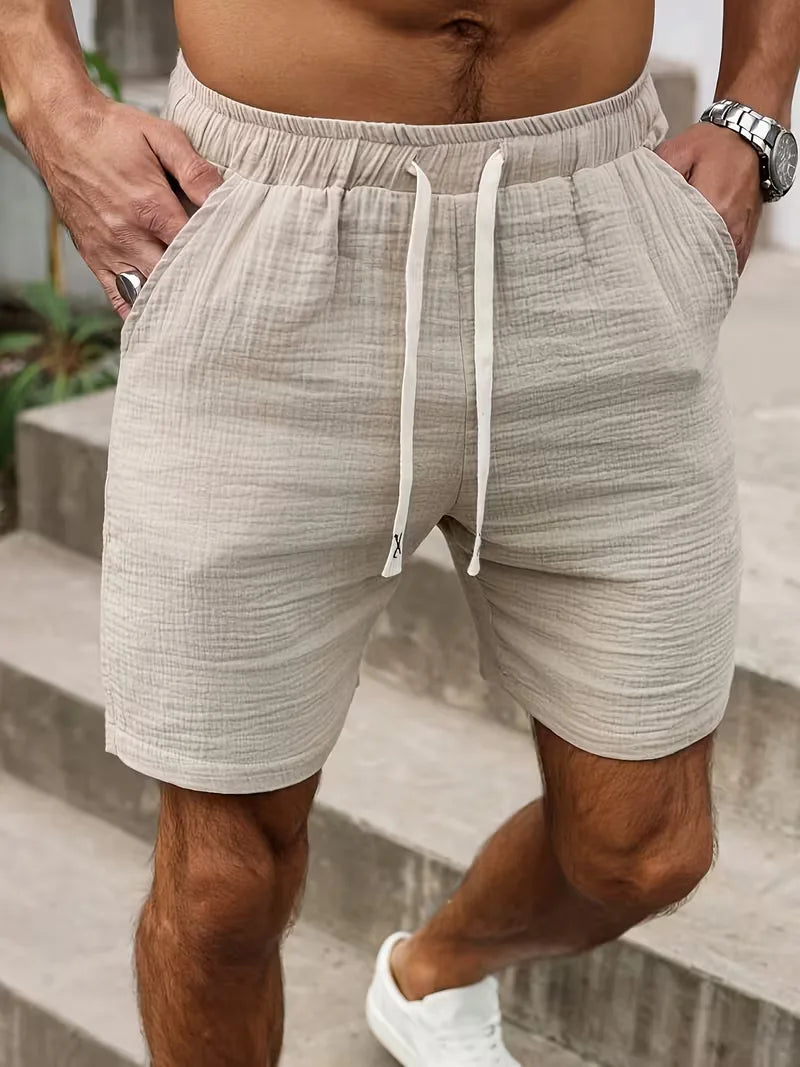 Comfortabele beige heren shorts, perfect voor strand, vakantie of zomerse casual dagen dankzij de relaxed fit.