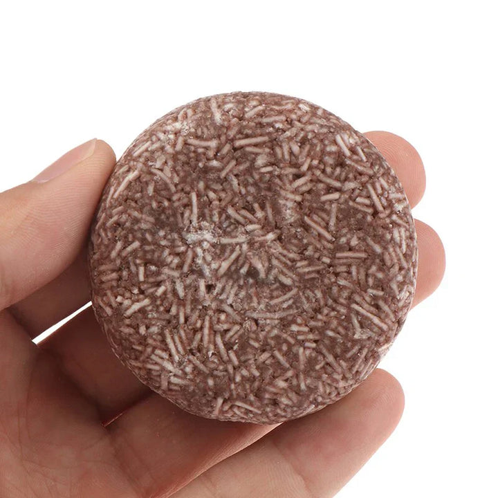 "Biologische haarverduistering shampoo; compacte bar, donkerder en voller haar, groene verpakking, natuurlijke haarverzorging