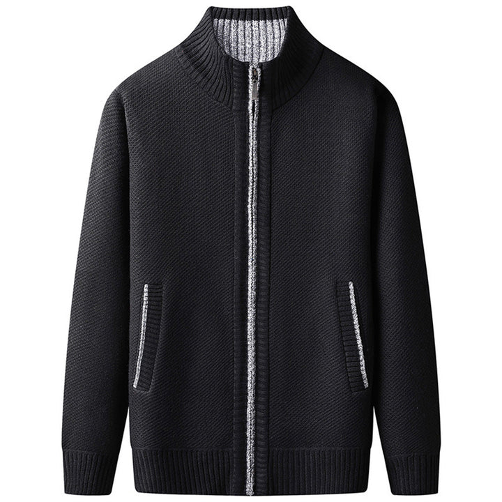 "Blauw herenvest van hoogwaardige fleece met rits en hoge kraag, perfect voor lente. Warm en veelzijdig ontwerp."