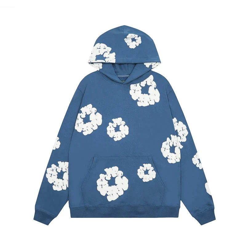 "Blauwe denim hoodie met bloemenprint en capuchon, trendy en comfortabel voor heren in de winter."