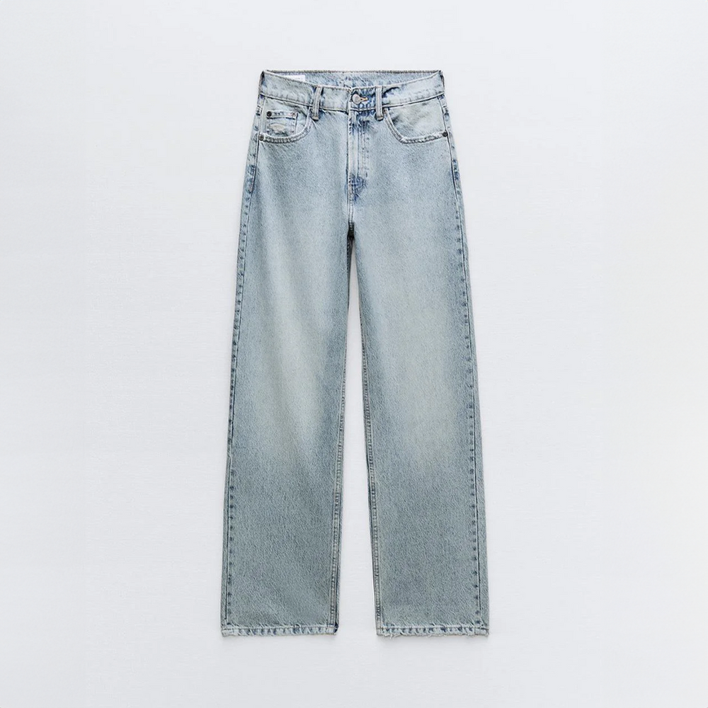 Trendy grijze dames jeans met scheuren, loose fit en rechte pijpen, perfect voor casual mode.