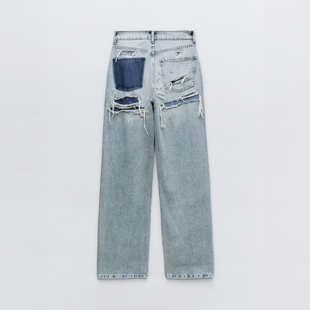Comfortabele vintage ripped jeans voor dames, rechte pasvorm, ideaal voor een relaxte stijl.