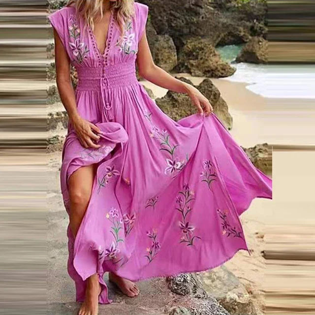 Bohemian maxi zomerjurk voor dames met elegante bloemenborduursels en V-hals, ideaal voor vakantie.