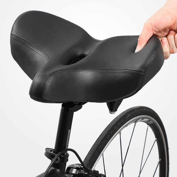 Hoogwaardig comfortzadel voor damesfietsen, ergonomisch en breed voor extra ondersteuning.