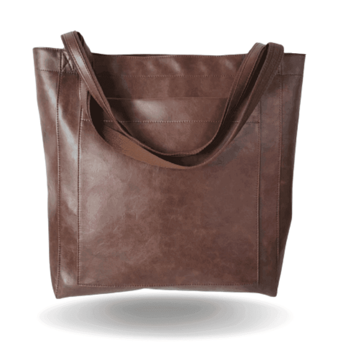 Donkerbruine elegante dames handtas in leerlook, ideaal voor ruim opbergen en een chique uitstraling.