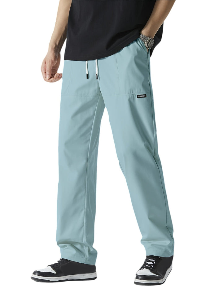 "Casual chique heren joggingbroek, donkergrijs, ademende stof, elastische tailleband met trekkoord, comfortabele pasvorm."