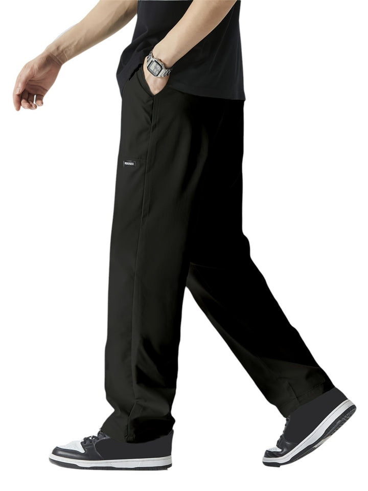 "Casual chique heren joggingbroek, donkergrijs, ademende stof, elastische tailleband met trekkoord, comfortabele pasvorm."
