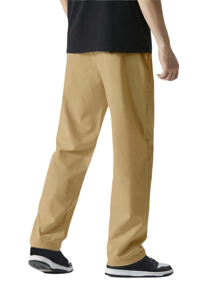 "Casual chique heren joggingbroek, donkergrijs, ademende stof, elastische tailleband met trekkoord, comfortabele pasvorm."