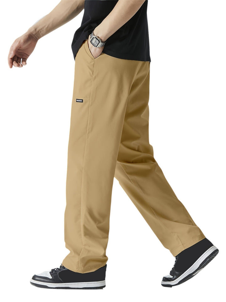 "Casual chique heren joggingbroek, donkergrijs, ademende stof, elastische tailleband met trekkoord, comfortabele pasvorm."