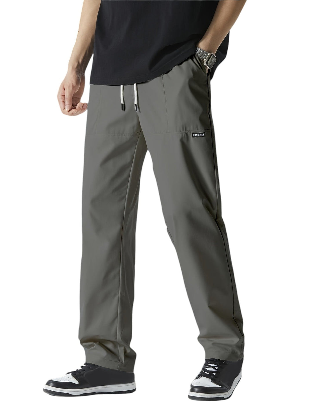 "Casual chique heren joggingbroek, donkergrijs, ademende stof, elastische tailleband met trekkoord, comfortabele pasvorm."