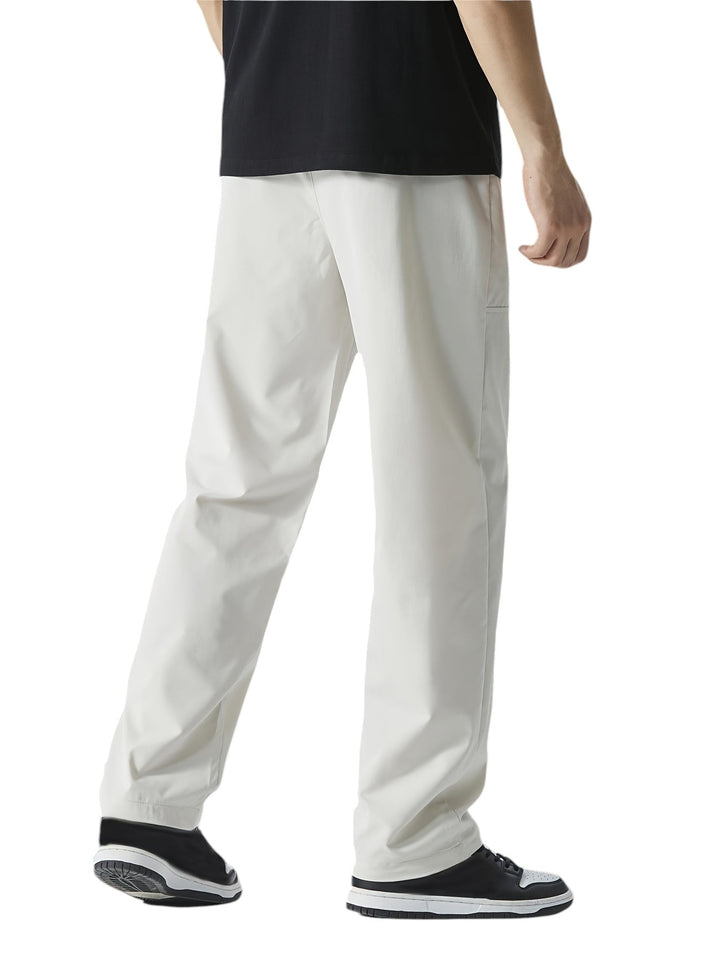 "Casual chique heren joggingbroek, donkergrijs, ademende stof, elastische tailleband met trekkoord, comfortabele pasvorm."