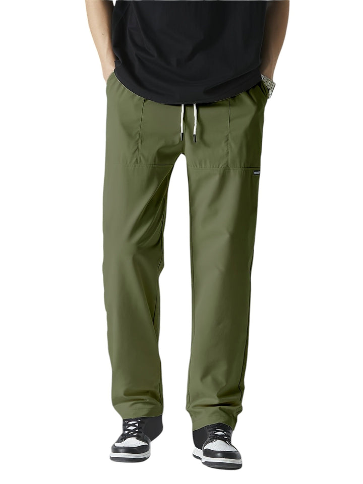 "Casual chique heren joggingbroek, donkergrijs, ademende stof, elastische tailleband met trekkoord, comfortabele pasvorm."