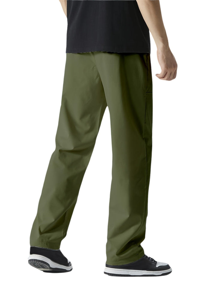 "Casual chique heren joggingbroek, donkergrijs, ademende stof, elastische tailleband met trekkoord, comfortabele pasvorm."