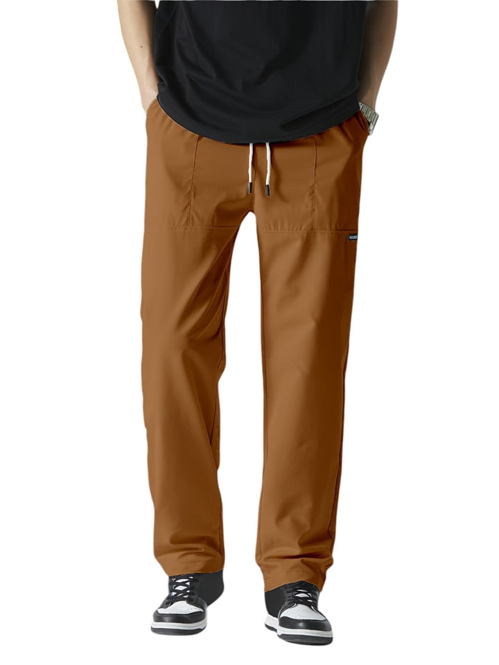 "Casual chique heren joggingbroek, donkergrijs, ademende stof, elastische tailleband met trekkoord, comfortabele pasvorm."