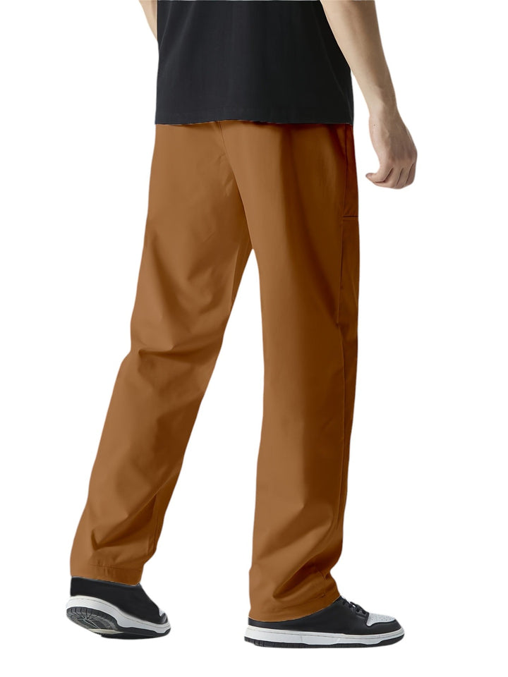 "Casual chique heren joggingbroek, donkergrijs, ademende stof, elastische tailleband met trekkoord, comfortabele pasvorm."