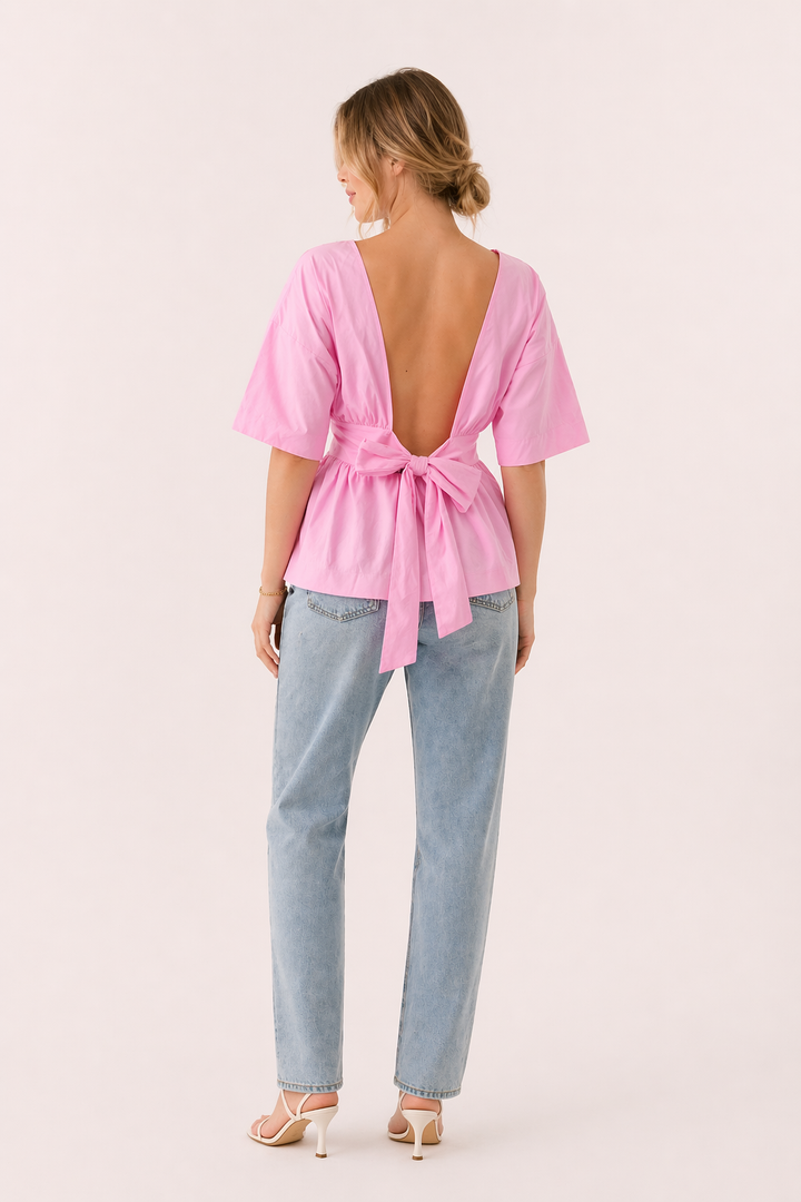 Comfortabele V-hals dames top met wijde mouwen, ideaal voor ontspannen casual zomer outfits.