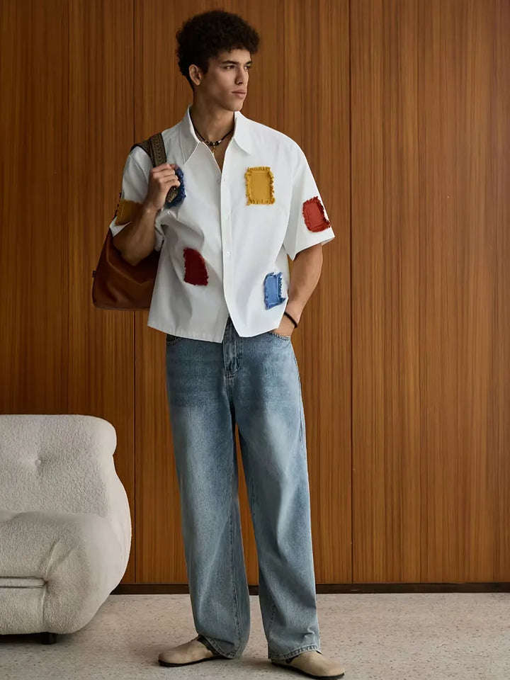 Casual heren zomeroverhemd met korte mouwen en uniek patchwork design. Comfortabel en trendy.