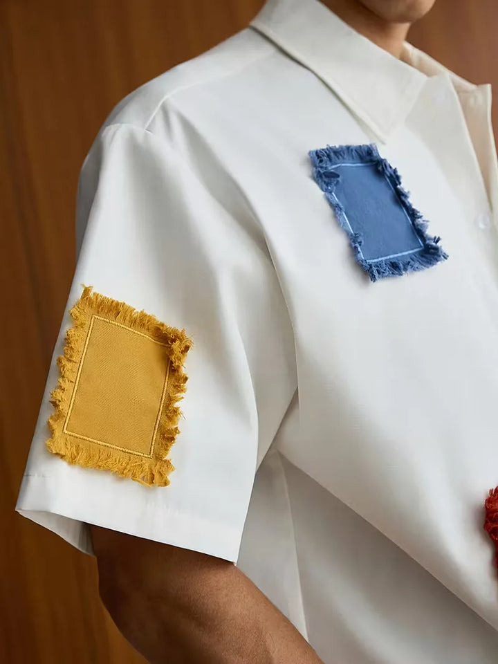 Heren overhemd met opvallend patchwork patroon en korte mouwen. Trendy en perfect voor casual zomerstijl.