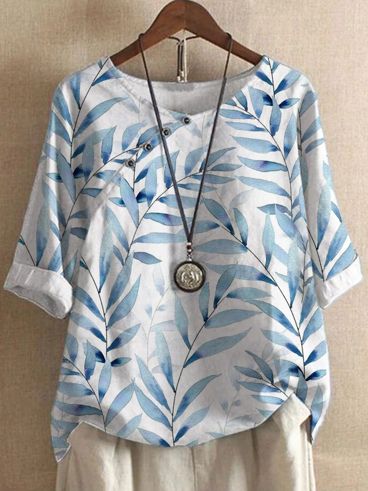 "Casual zomerlinnen overhemd in wit, licht en ademend, ideale damesblouse voor warme dagen met losse pasvorm."