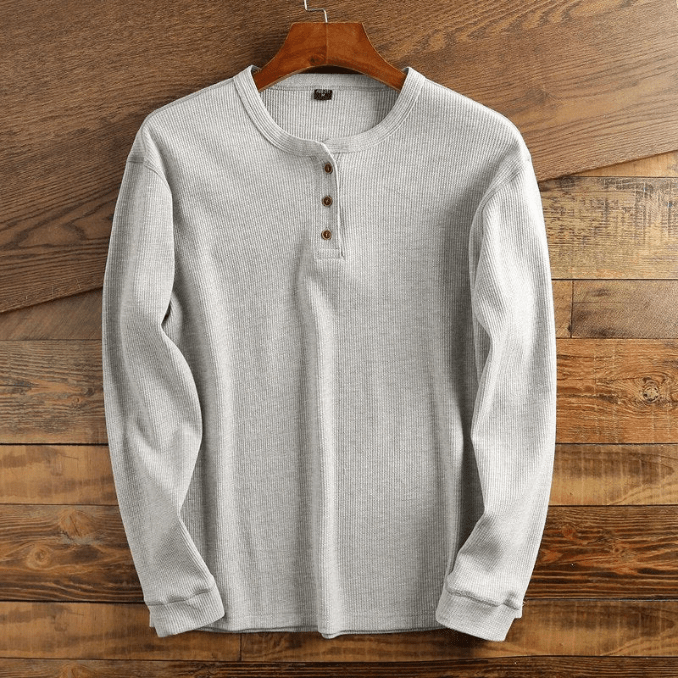"Comfortabel Henley shirt met wafelstructuur voor heren. Stijlvol, ademend en perfect voor elke gelegenheid."
