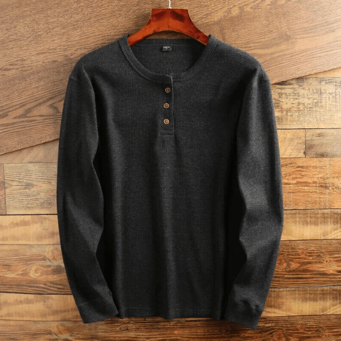 "Comfortabel Henley shirt met wafelstructuur voor heren. Stijlvol, ademend en perfect voor elke gelegenheid."