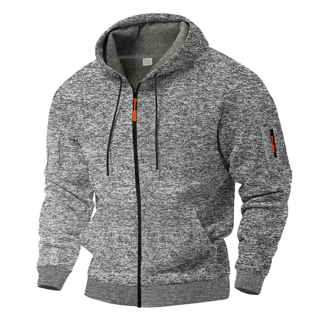 Warm heren outdoor vest met capuchon, rits en praktische zakken. Perfect voor koele dagen.