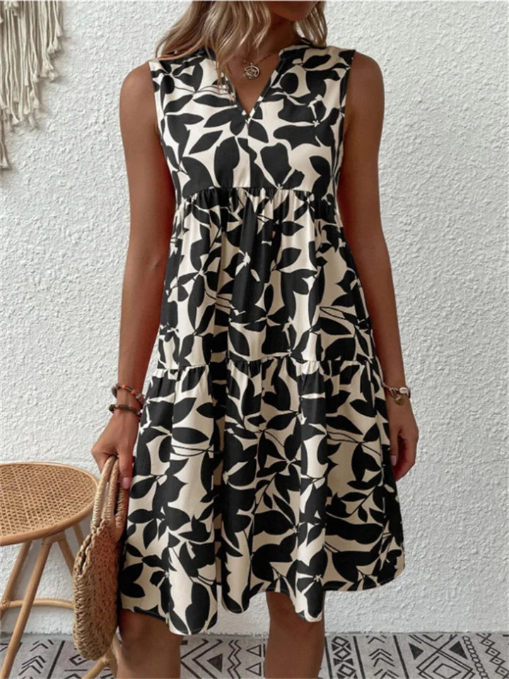 Blauwe bloemen midi zomerjurk voor vrouwen, een comfortabele en modieuze keuze.