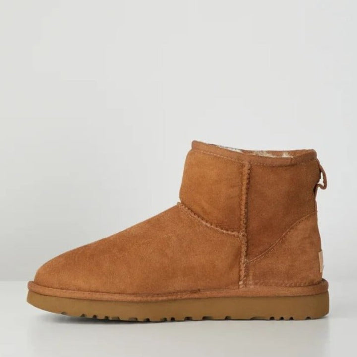 Comfortabele Boston Mini dames winterlaarzen met anti-slip zool. Warme en stijlvolle enkellaarzen voor casual wintermode.