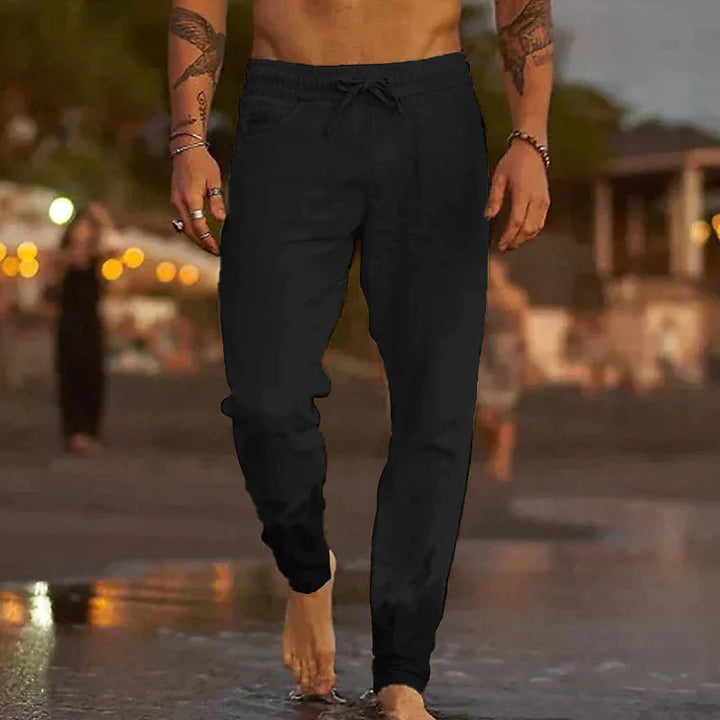 Volledige weergave van de heren casual broek, relaxte pasvorm, trekkoord en elastische taille voor dagelijks comfort.