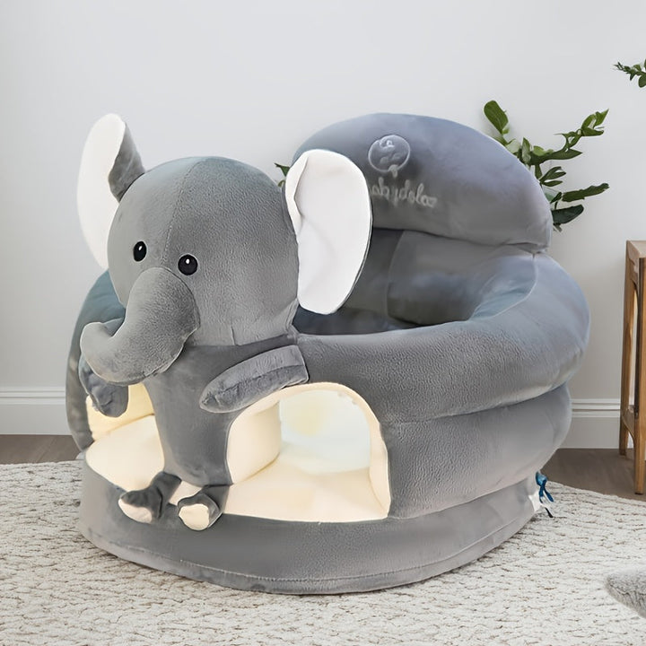 Zachte grijze baby zitstoel van pluche, perfect voor de eerste zitavonturen en stabiel leren zitten.