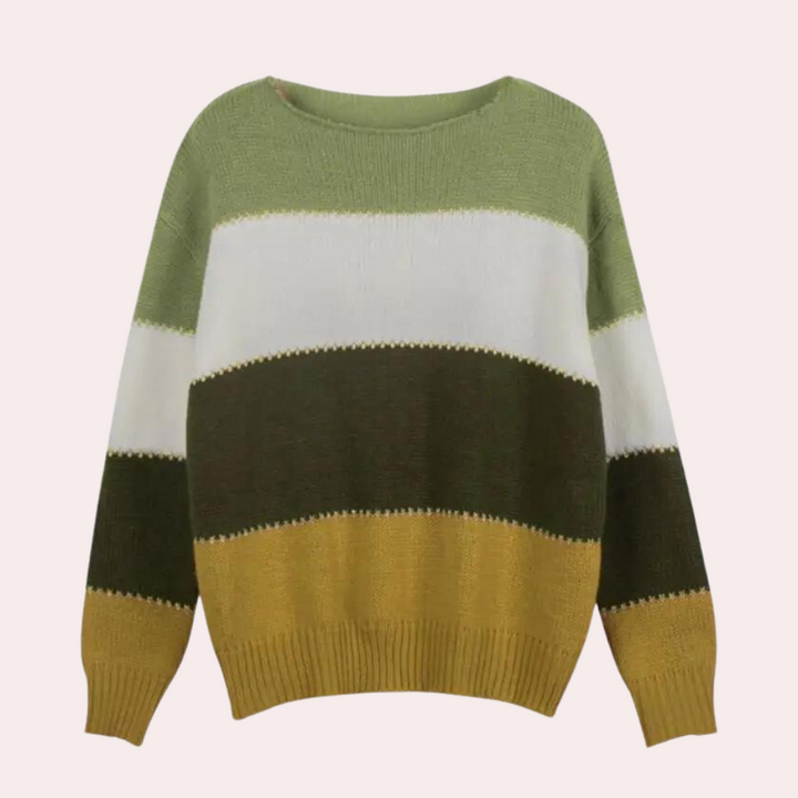 Model draagt een casual gestreepte damestrui met lange mouwen, comfortabel voor dagelijks gebruik.